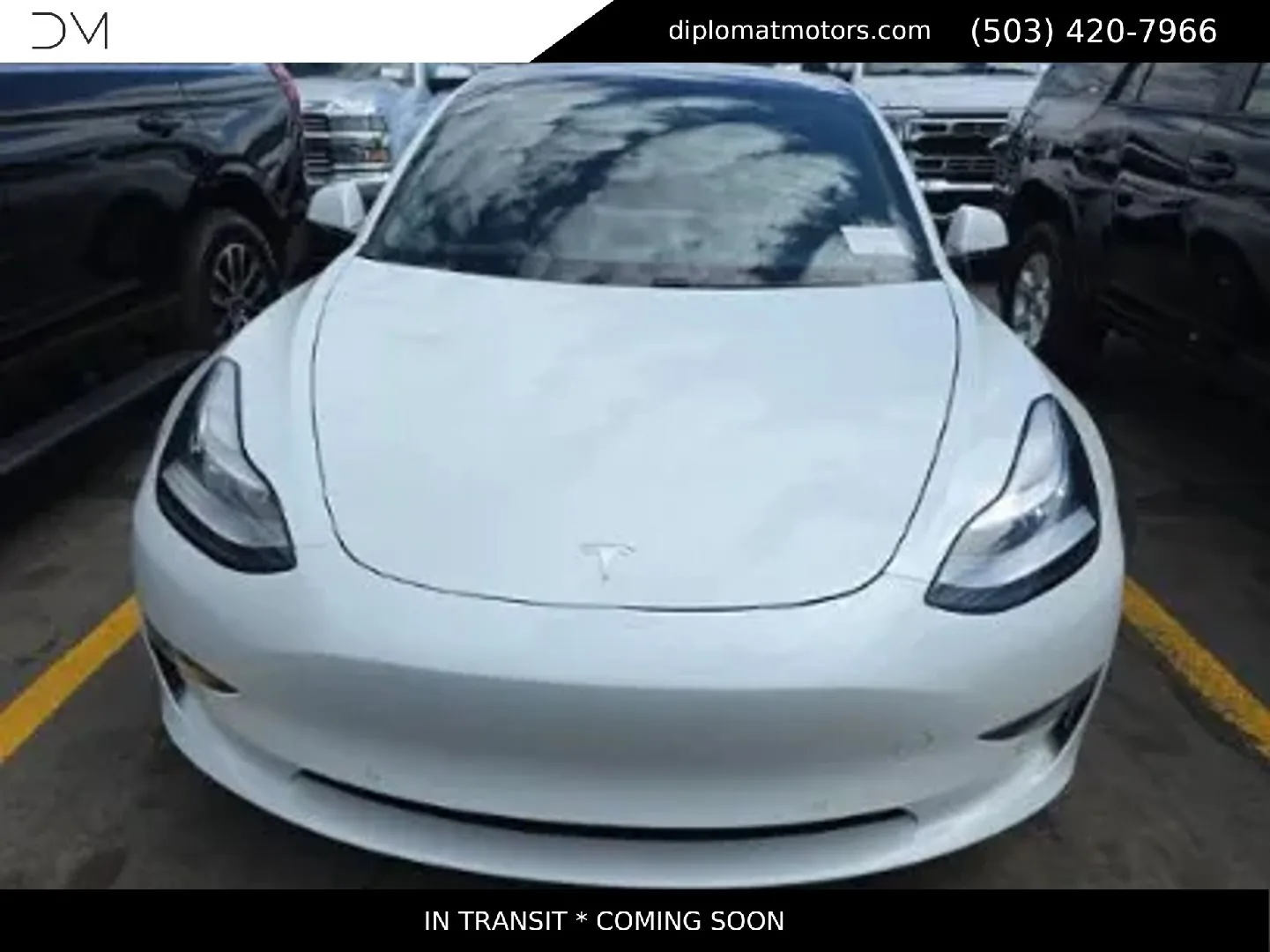 The front of a used Tesla Model 3 on the Diplomat lot